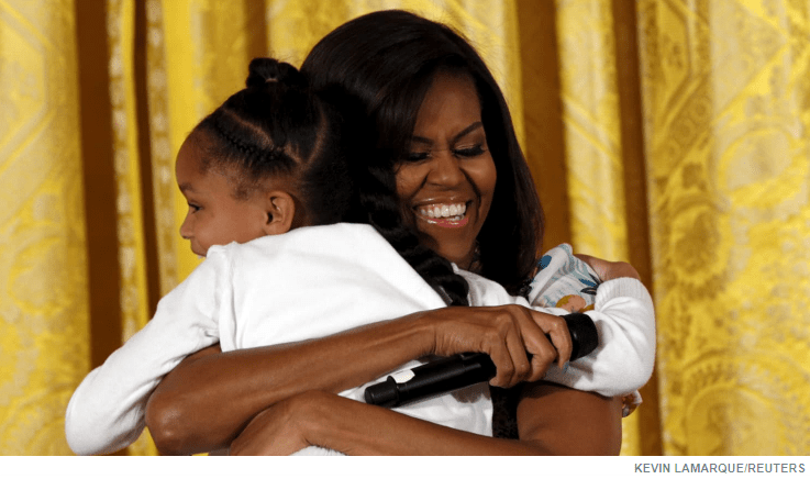 Michelle Obama Hugging her Daughter